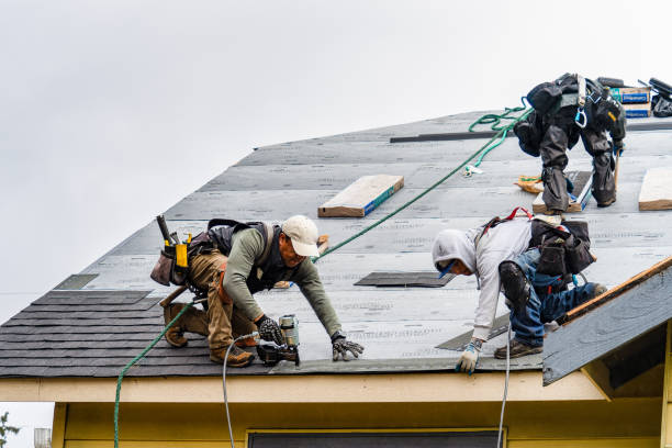 Professional Gutter Installation technician working in Hillsboro, OR